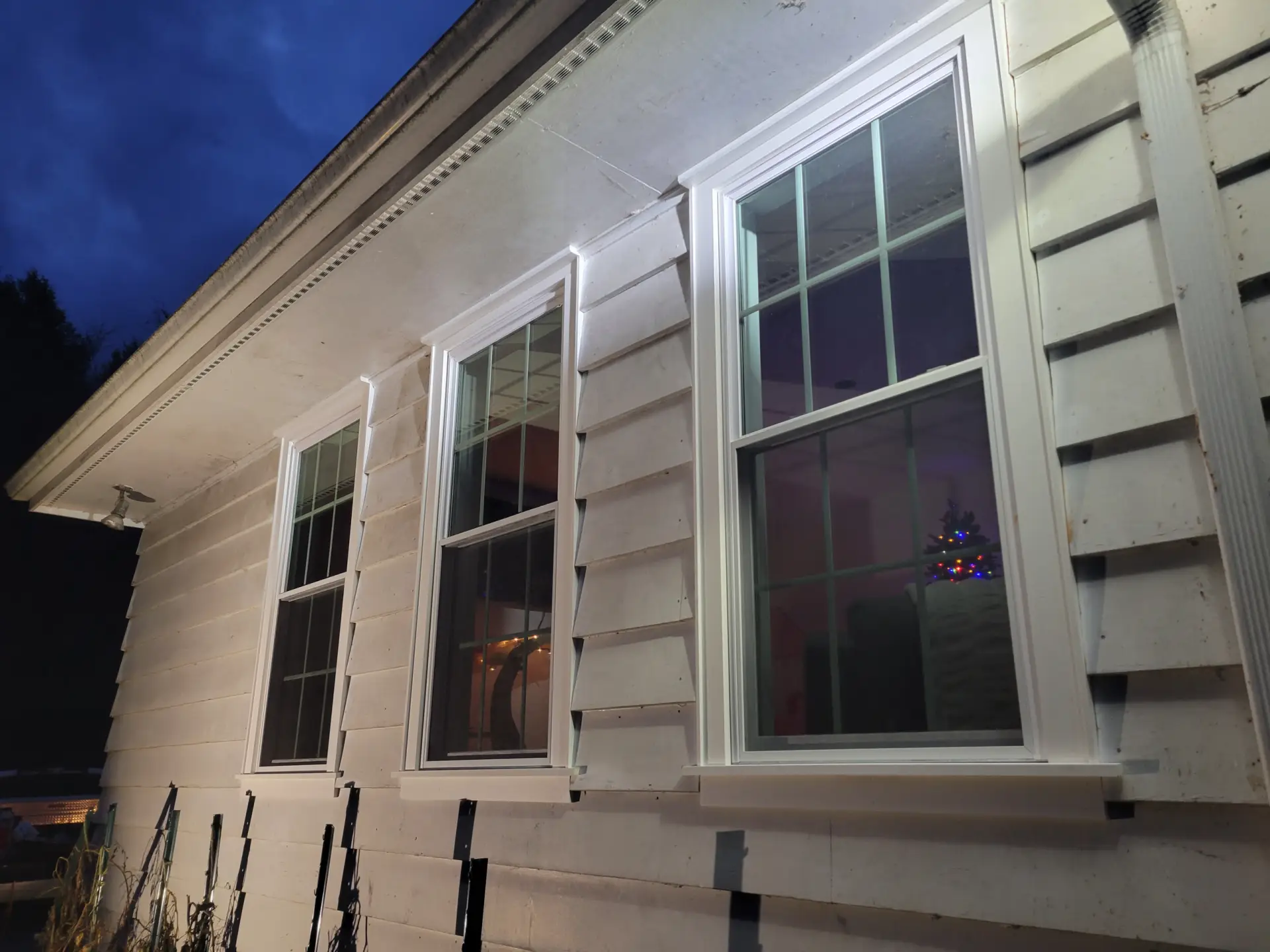 New window installation for converted garage in orangeville, pa by Lewis Build and Remodel, LLC